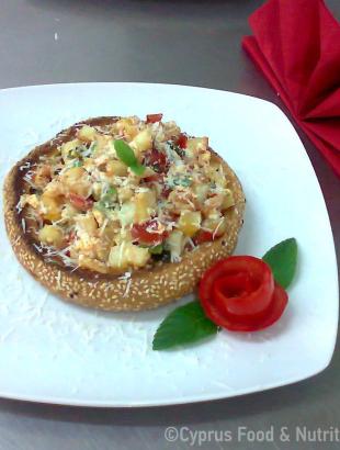 Βαβατσινιάτικα αυγά, σε ψωμί (Μαγειρεύω Κυπριακά 2014). &lt;br/&gt; Πηγή: Στάλω Λαζάρου.