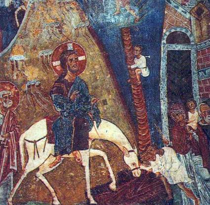 Το δέντρο φοίνικας σε τοιχογραφία (μέσα 11ου αι.) της Εισόδου του Ιησού στα Ιεροσόλημα από τον ναό του Αγίου Νικολάου Στέγης στην Κακοπετριά.