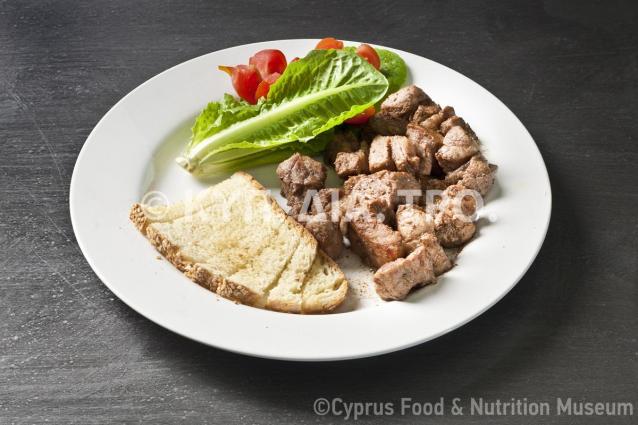 Αφέλια ορουντιώτικα (όπως μαγειρεύονται στην κοινότητα Ορούντας). Μαγειρεύω Κυπριακά 2015. <br/> © Μουσείο Κυπριακών Τροφίμων και Διατροφής. 